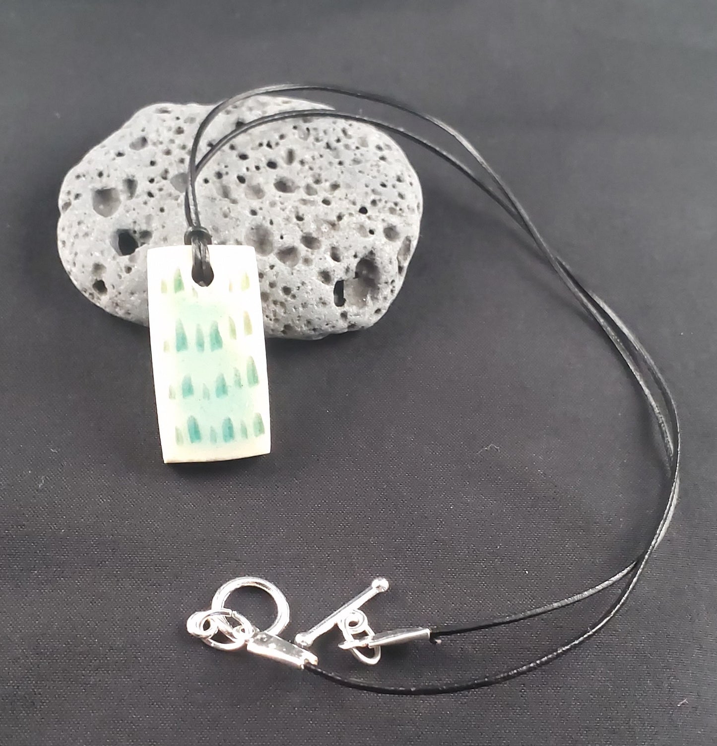 Ceramic Jewellery Pendant Set - one brown one white with blue glass / glaze