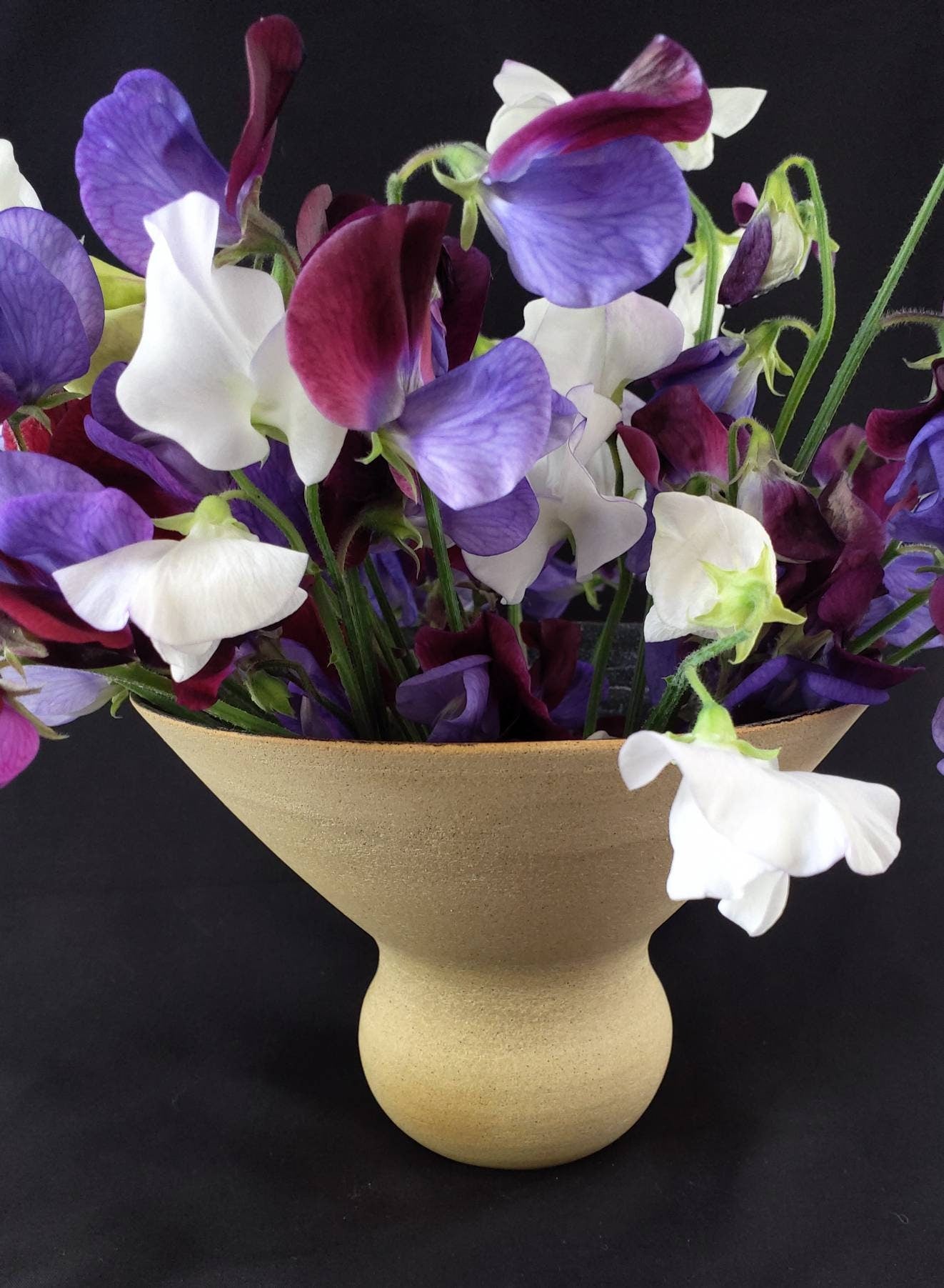 Self arranging posy vase - stoneware high gloss Black and White glaze inside raw clay outside